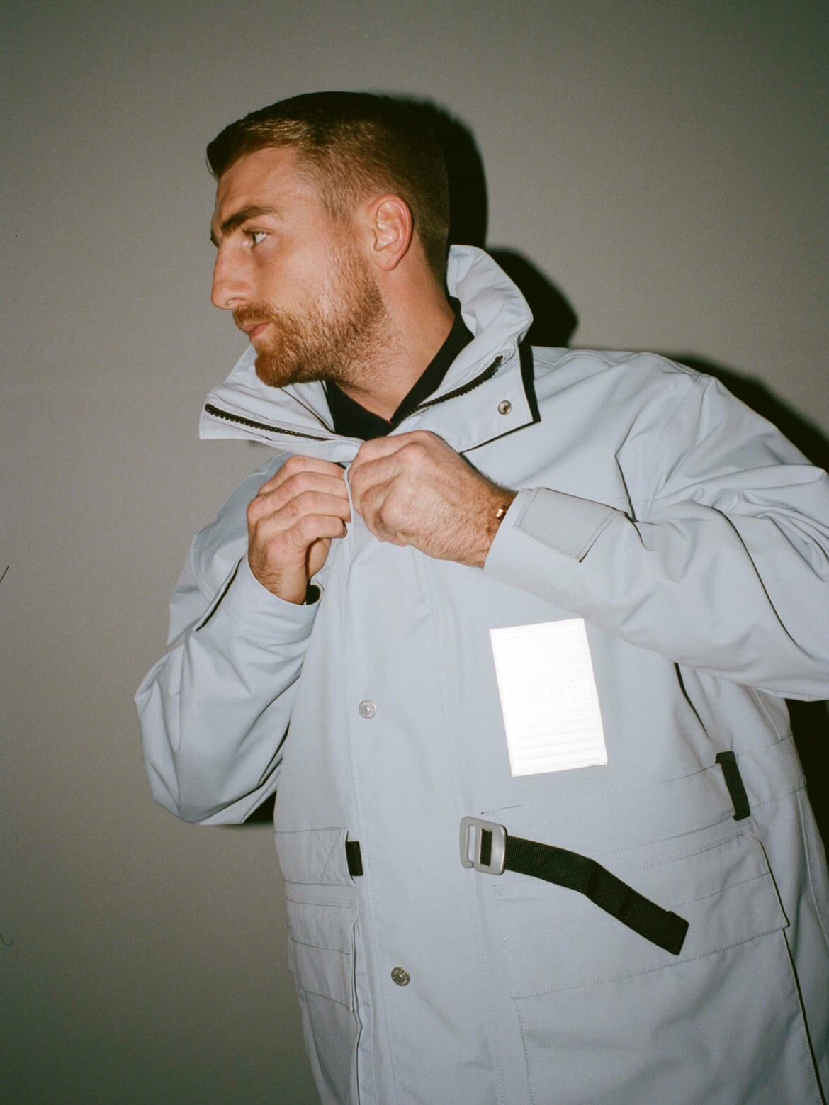 Jon Haggerty wearing a light grey jacket