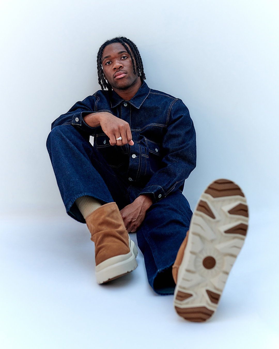 Destiny Udogie wearing UGG in an editorial portrait